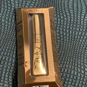 Too faced melted gold lip gloss